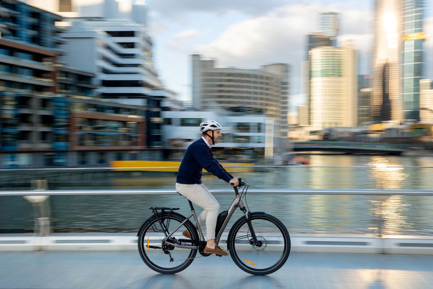 person riding an e-bike in city
