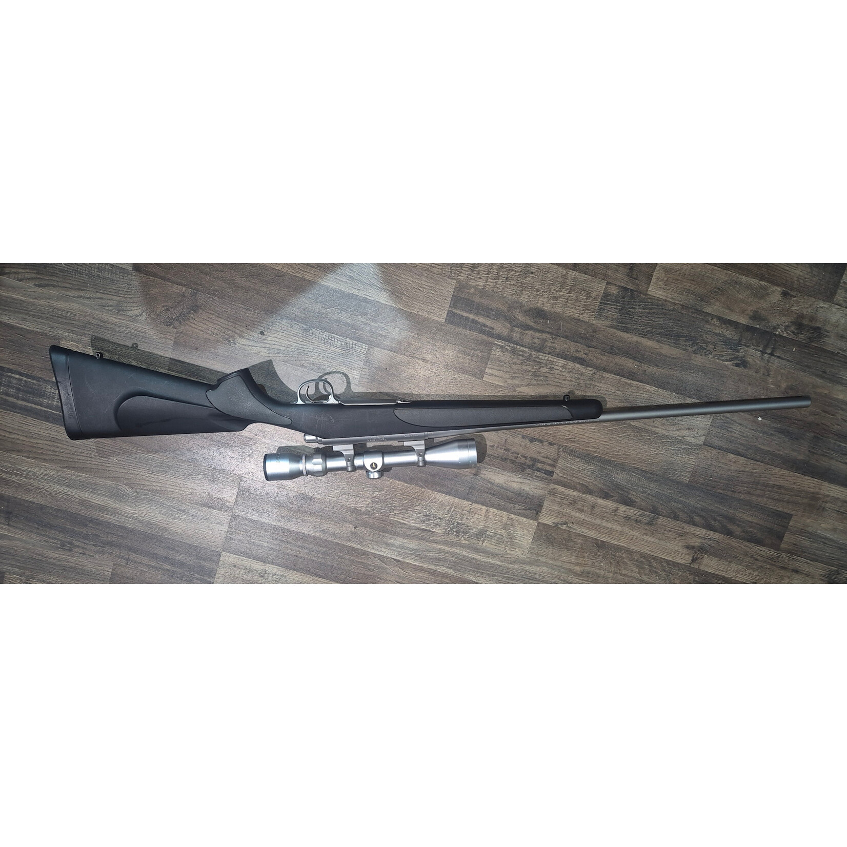 Remington Pre Owned Remington 700 Stainless 243Win with 3-9x40 Tasco Worlclass Scope 610bbl