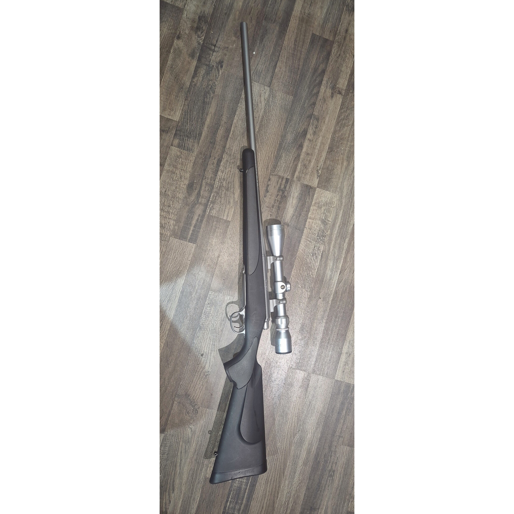 Remington Pre Owned Remington 700 Stainless 243Win with 3-9x40 Tasco Worlclass Scope 610bbl