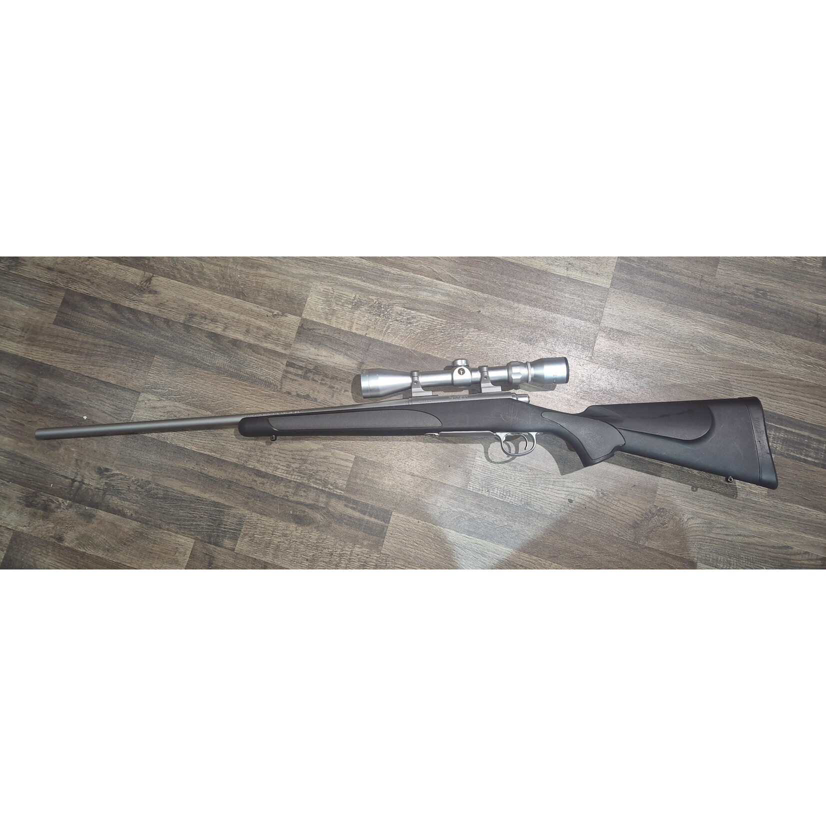 Remington Pre Owned Remington 700 Stainless 243Win with 3-9x40 Tasco Worlclass Scope 610bbl