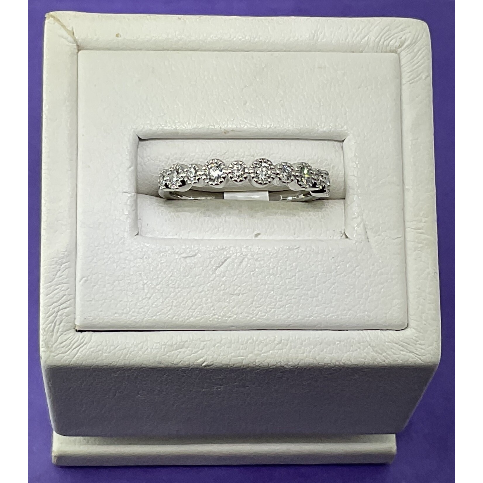 10KW 0.25ctw Dia. Bezel Sz. 6.75