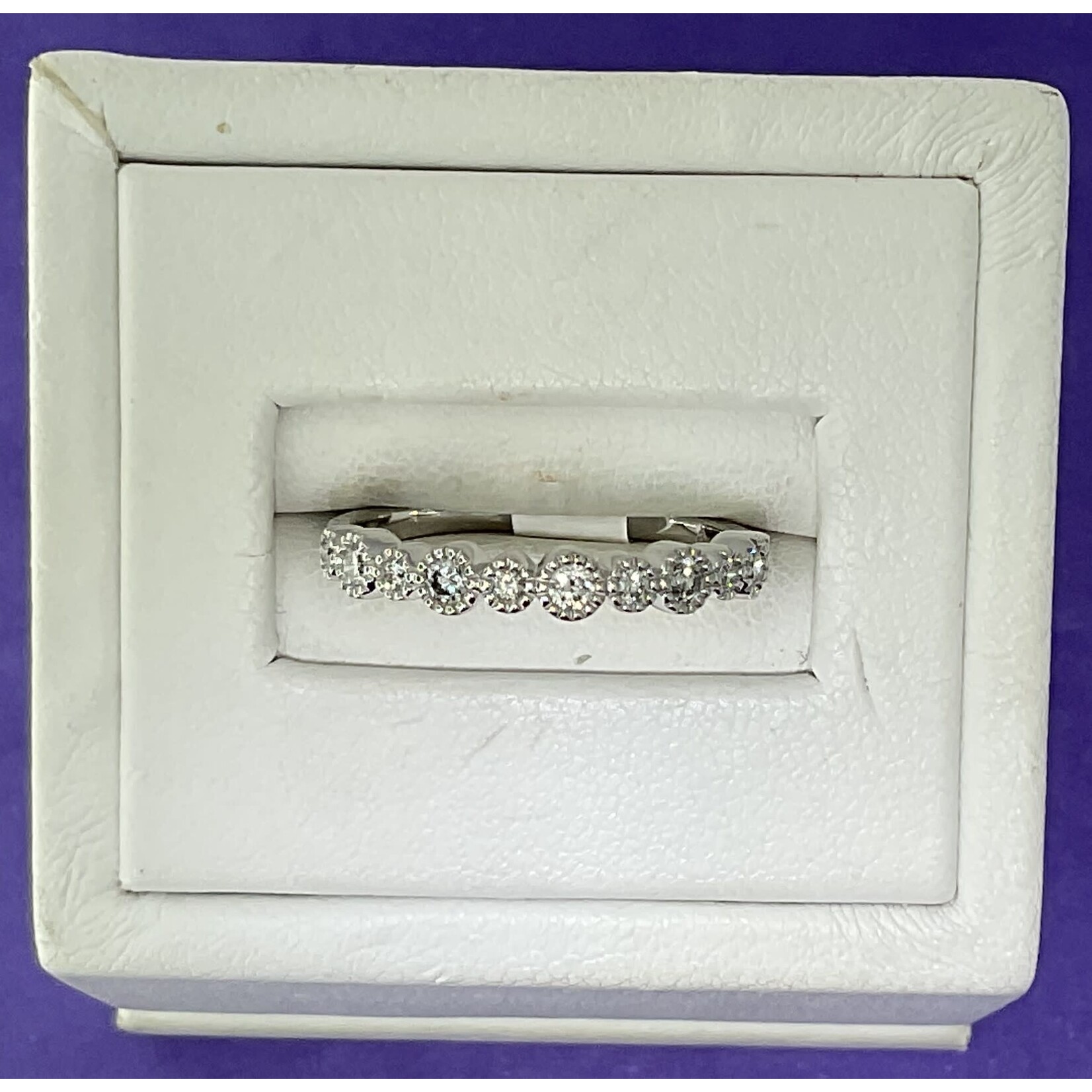 10KW 0.25ctw Dia. Bezel Sz. 6.75