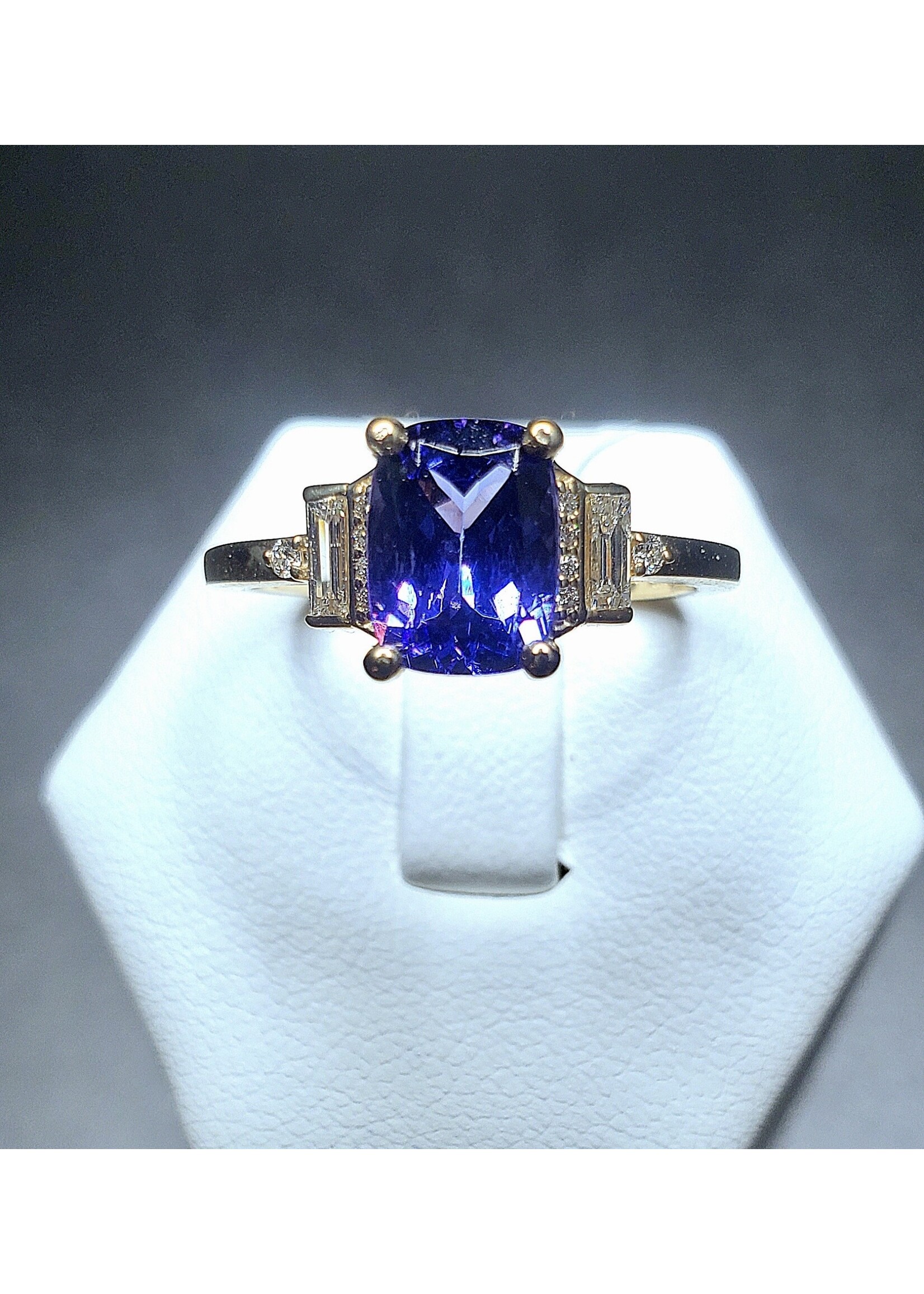 14 Karat Yellow Gold 1.49 Carat Natural Tanzanite w/ 1/6 Carat Total Weight Diamond Baguettes and Rounds Accents