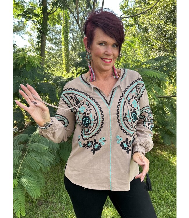 Savanna Jane Geometric and Floral Embroidery V Neckline Top with Tassel  detail and Shirred Cuffed Long Sleeves