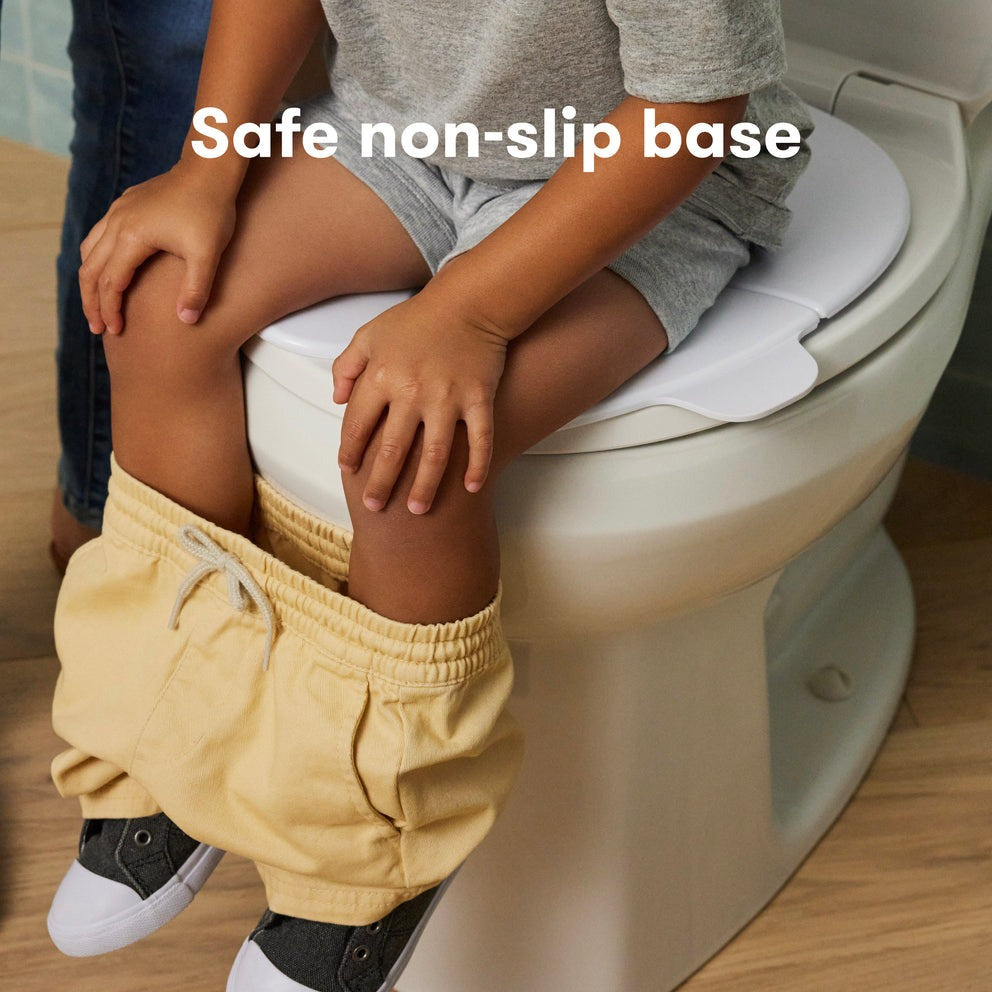 Frida Baby Siège de toilette pliable et transportable
