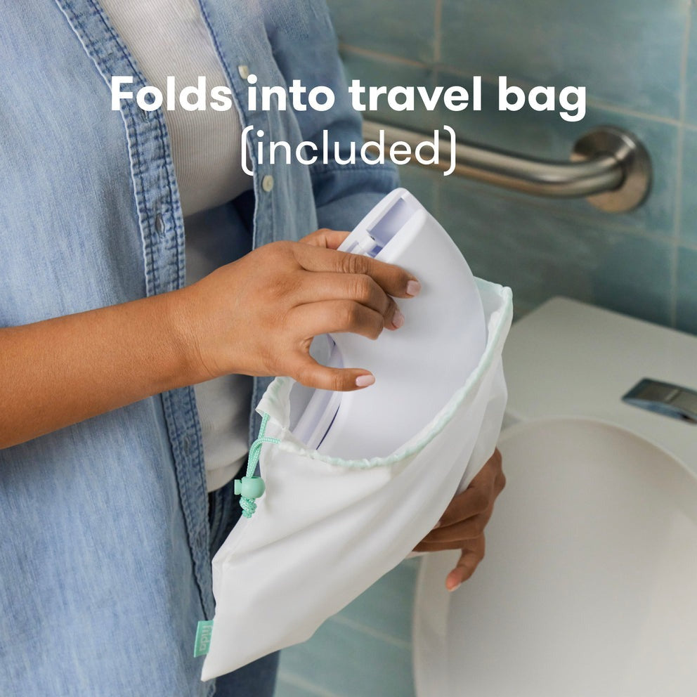 Frida Baby Siège de toilette pliable et transportable