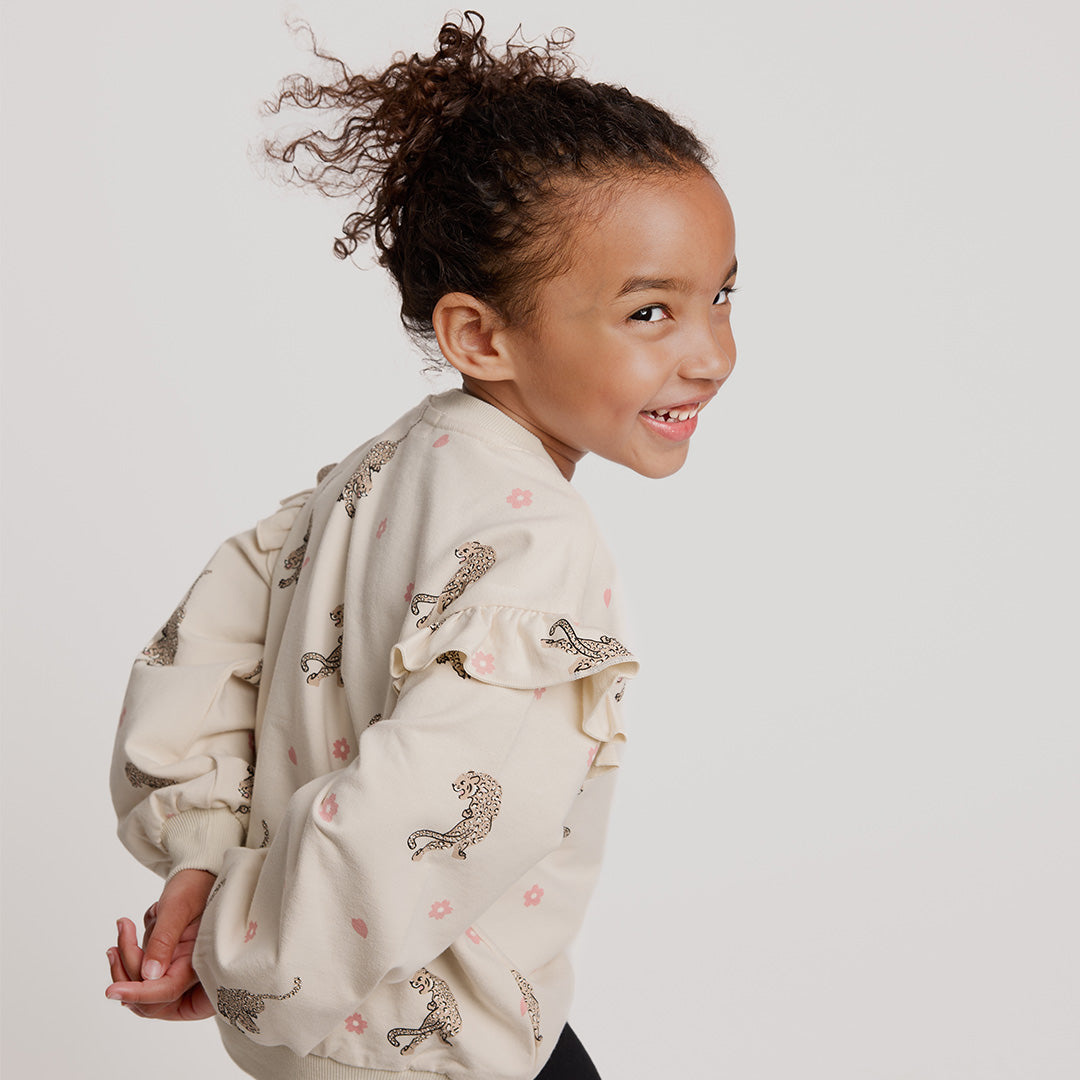 Miles the label Chandail à volants crème leopard avec fleurs