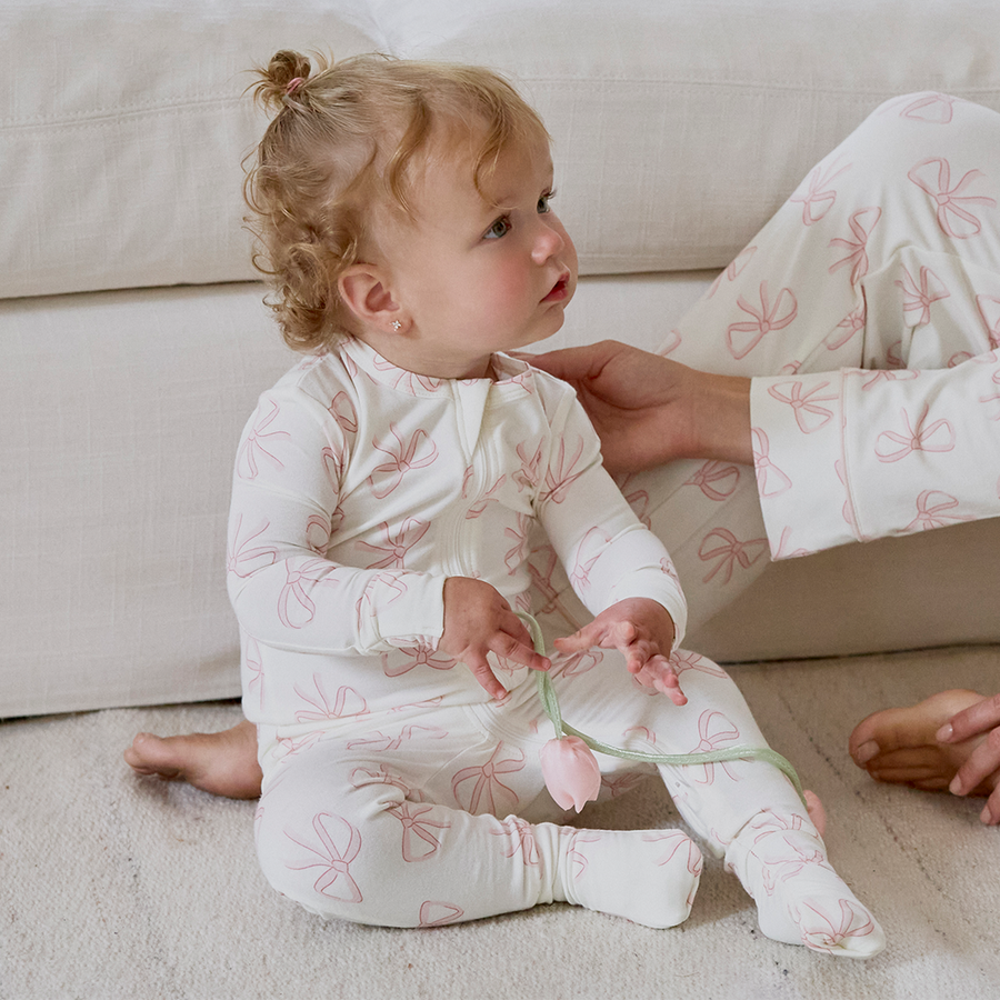 Petit Lem Dormeuse avec pieds rabattables imprimé de boucles rose