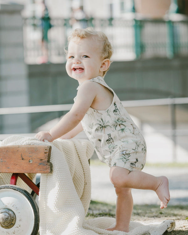 Deux Par Deux Barboteuse en jersey de coton biologique beige imprimé zèbres
