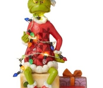 Grinch on Present Wrapped with String of Lights