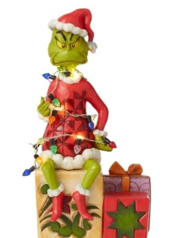 Grinch on Present Wrapped with String of Lights