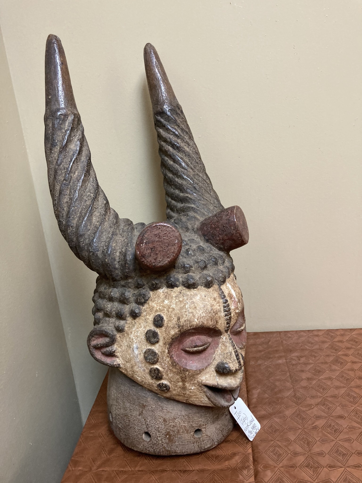 Ibo (igbo) headpiece/mask of wood, kaolin of red pigment that had use in the powerful men's secret society called mmo or mwo or mwa. It is 20 1/2" tall and 9/14" w. The Ibo live in the South east of N