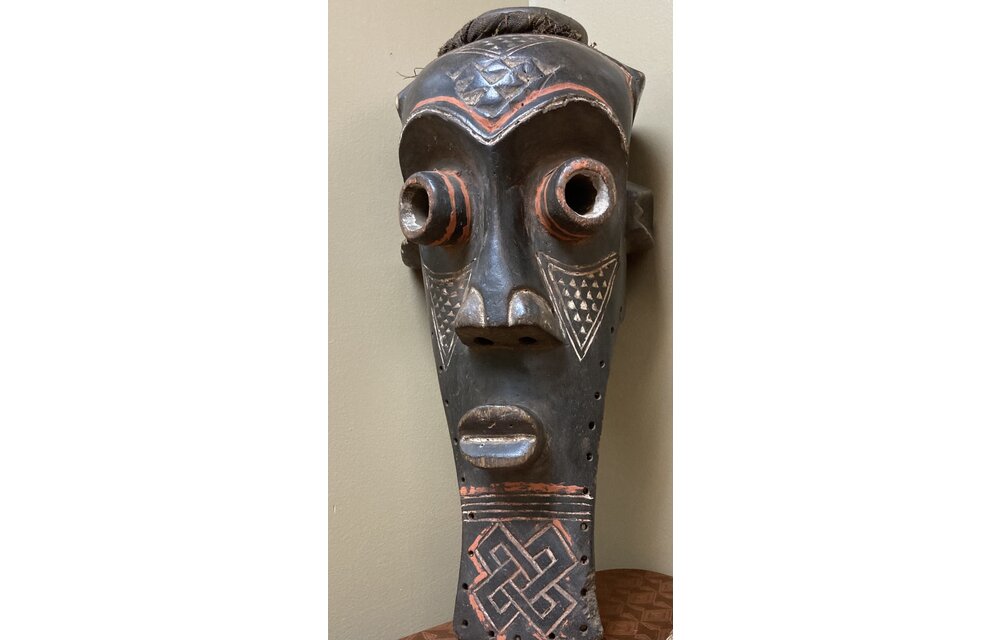 Kete of the Kuba confederation: initiation mask wooden with kaolin white and tukala red pigment. 20 1/4" tall x 9" wide (ear to ear). Dem Rep of Congo