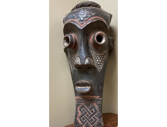 Kete of the Kuba confederation: initiation mask wooden with kaolin white and tukala red pigment. 20 1/4" tall x 9" wide (ear to ear). Dem Rep of Congo
