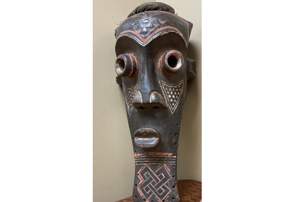 Kete of the Kuba confederation: initiation mask wooden with kaolin white and tukala red pigment. 20 1/4" tall x 9" wide (ear to ear). Dem Rep of Congo