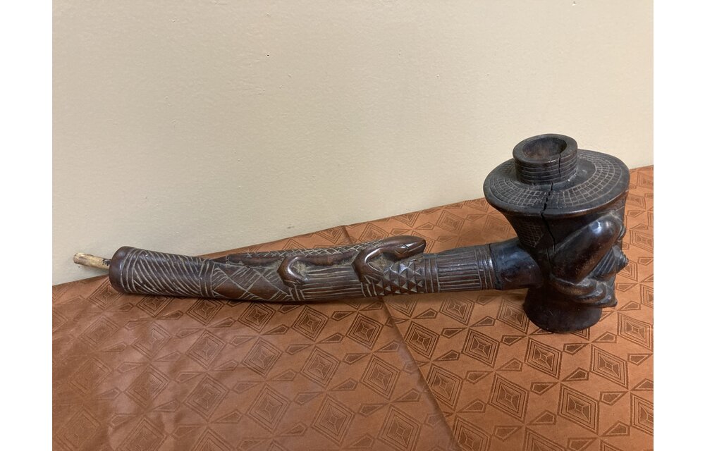 Kuba (bakuba): Wooden pipe, probably made by the Denguese who did much wood carvings as one of the 18 kuba tribes in the Democratic Republic of Congo. 16 1/4" L x 5 1/4" tall