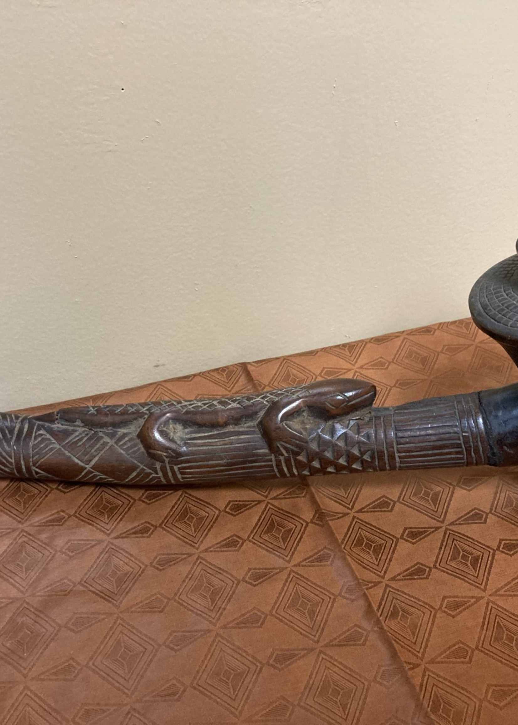 Kuba Kuba (bakuba): Wooden pipe, probably made by the Denguese who did much wood carvings as one of the 18 kuba tribes in the Democratic Republic of Congo. 16 1/4" L x 5 1/4" tall