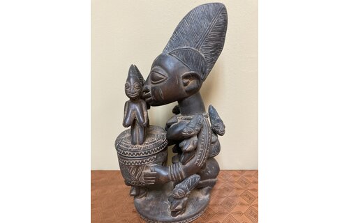 Yoruba Ajere. Used for divination. Most likely held cola nut, which are used in one of two forms of divination. 12 7/8 " h. x 6 5/8 " deep front to back. Nigeria