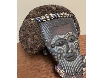 Lele are 1 of the 18 Kuba tribes. The Lele carve and dance mask like this at their annual founding of the tribe ceremonies. Dem Rep of Congo.