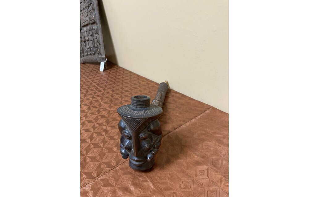 Kuba (bakuba): Wooden pipe, probably made by the Denguese who did much wood carvings as one of the 18 kuba tribes in the Democratic Republic of Congo. 16 1/4" L x 5 1/4" tall
