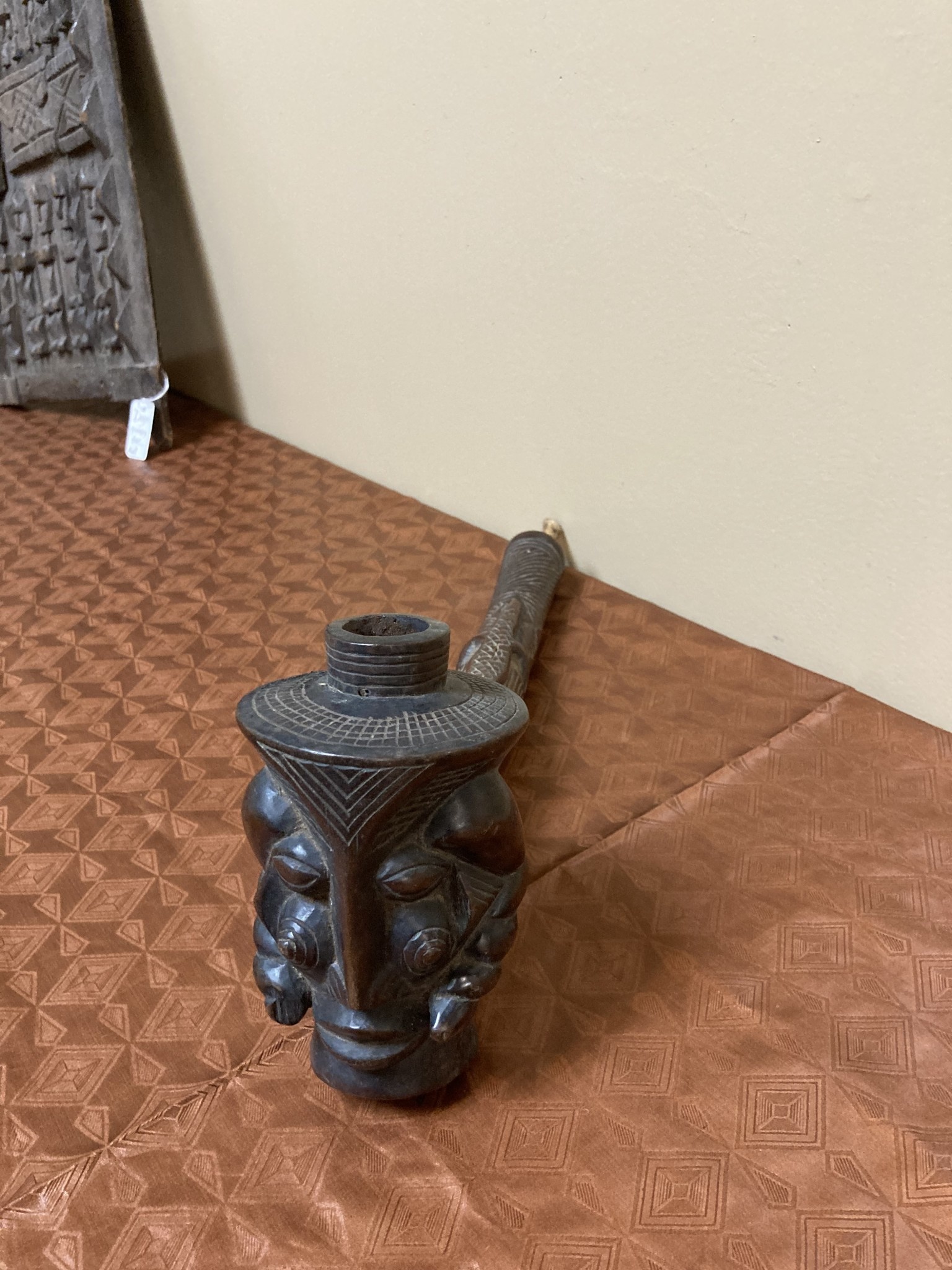 Kuba (bakuba): Wooden pipe, probably made by the Denguese who did much wood carvings as one of the 18 kuba tribes in the Democratic Republic of Congo. 16 1/4" L x 5 1/4" tall