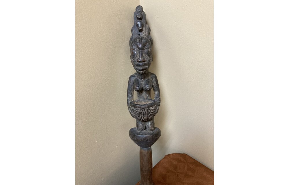 Yoruba Esu dance wand. Esu is one of the most important and prominent of the 401 orishas or demigods of the Yoruba religion in the south west of Nigeria. A look at the handle reveals evidence of use.
