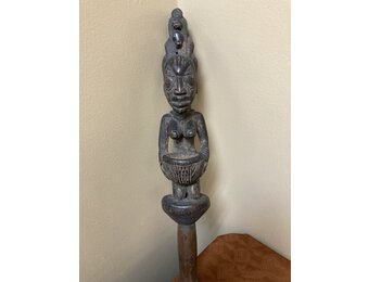 Yoruba Esu dance wand. Esu is one of the most important and prominent of the 401 orishas or demigods of the Yoruba religion in the south west of Nigeria. A look at the handle reveals evidence of use.