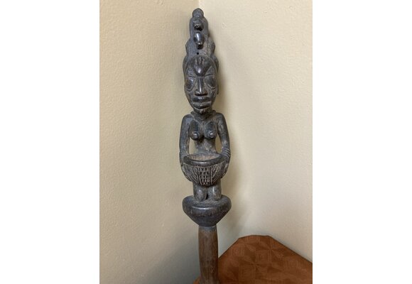 Yoruba Esu dance wand. Esu is one of the most important and prominent of the 401 orishas or demigods of the Yoruba religion in the south west of Nigeria. A look at the handle reveals evidence of use.