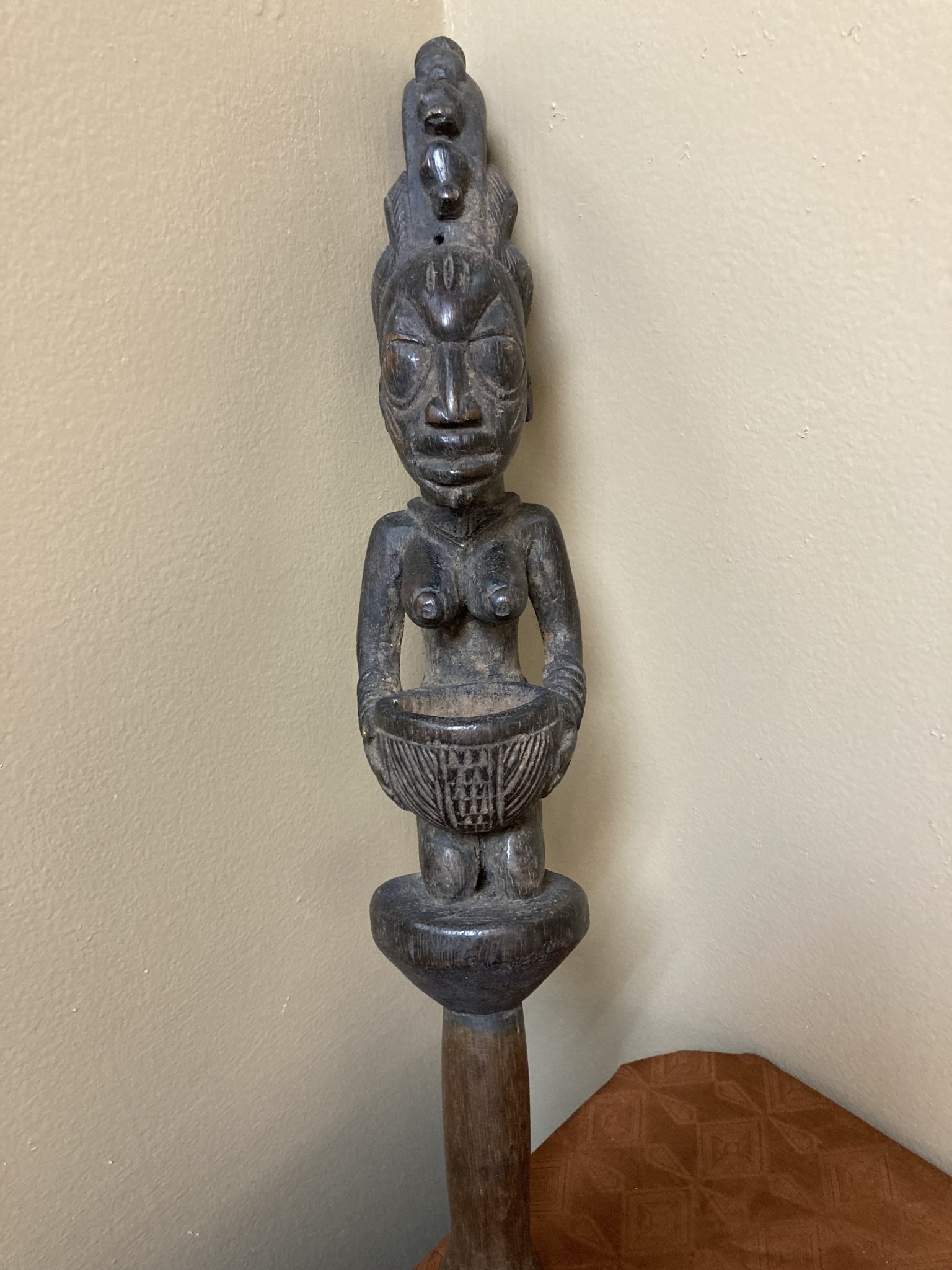 Yoruba Esu dance wand. Esu is one of the most important and prominent of the 401 orishas or demigods of the Yoruba religion in the south west of Nigeria. A look at the handle reveals evidence of use.