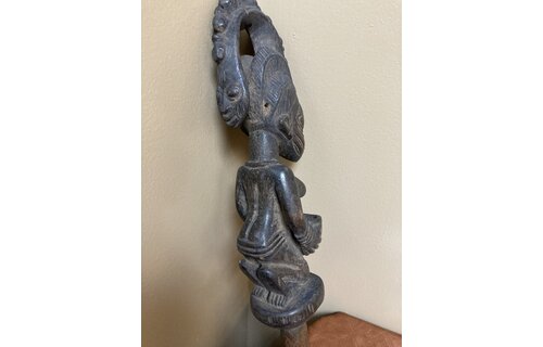 Yoruba Esu dance wand. Esu is one of the most important and prominent of the 401 orishas or demigods of the Yoruba religion in the south west of Nigeria. A look at the handle reveals evidence of use.