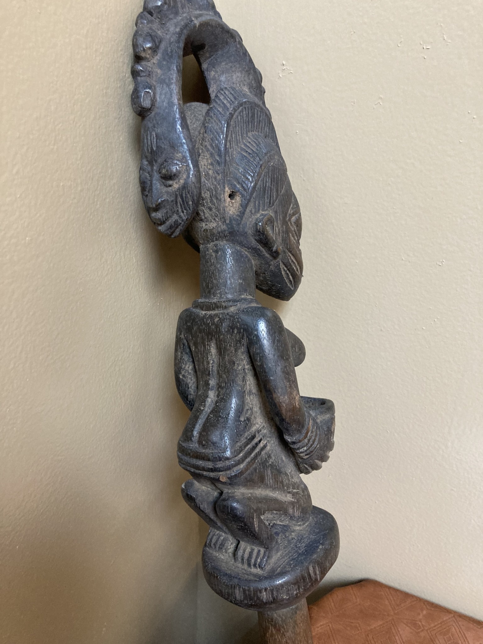 Yoruba Esu dance wand. Esu is one of the most important and prominent of the 401 orishas or demigods of the Yoruba religion in the south west of Nigeria. A look at the handle reveals evidence of use.