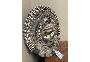 Dan (Yacuba) "Go Ge" mask: The job of this mask is to announce the death of the chief. The dan are found in SW ivory coast and next door in Liberia. Wood, cowrie shells, fabric, and kaolin (white colo