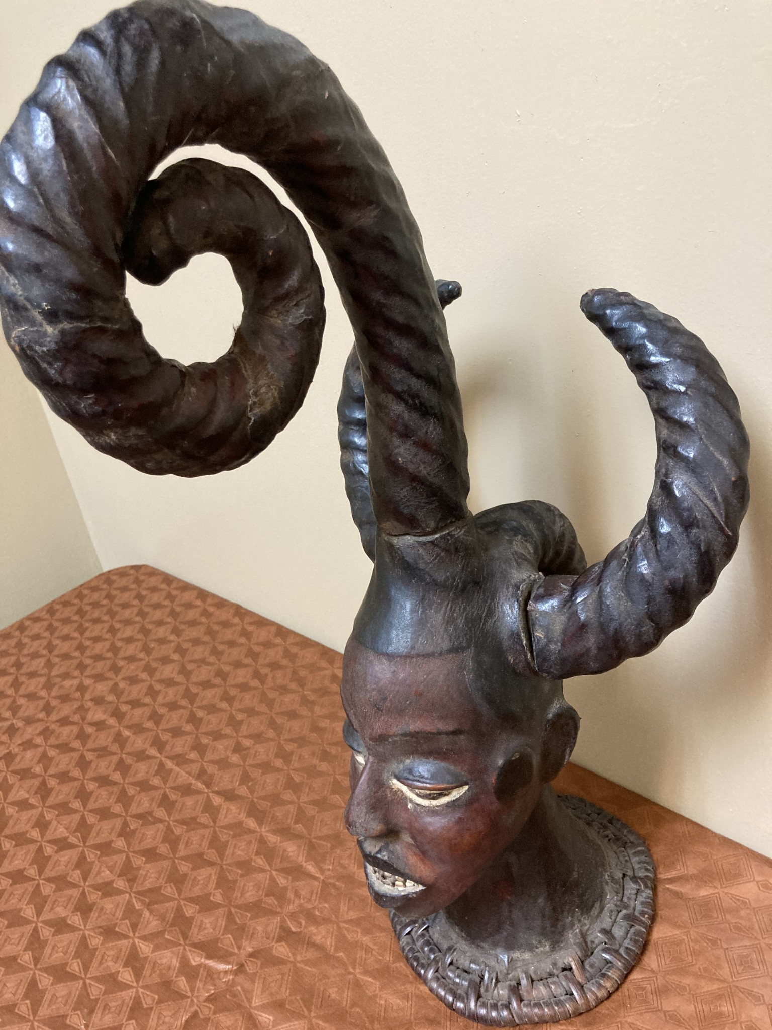 Ekoi (Ejagham): Ekoi wooden masks are covered with animal skin. These figures usually refer to cultural or war heroes. This piece was worn on the top of a woman's head. 20 1/4" tall x 11 1/4" W. Niger