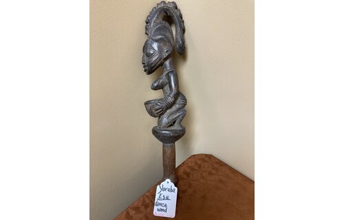 Yoruba Esu dance wand. Esu is one of the most important and prominent of the 401 orishas or demigods of the Yoruba religion in the south west of Nigeria. A look at the handle reveals evidence of use.