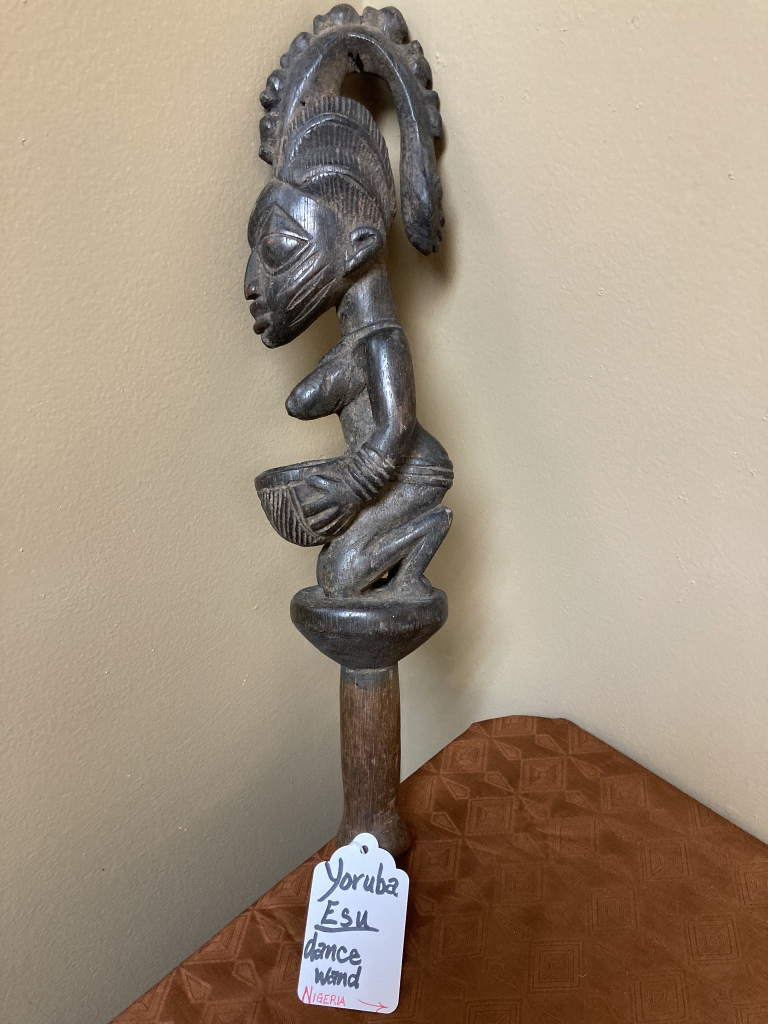 Yoruba Esu dance wand. Esu is one of the most important and prominent of the 401 orishas or demigods of the Yoruba religion in the south west of Nigeria. A look at the handle reveals evidence of use.