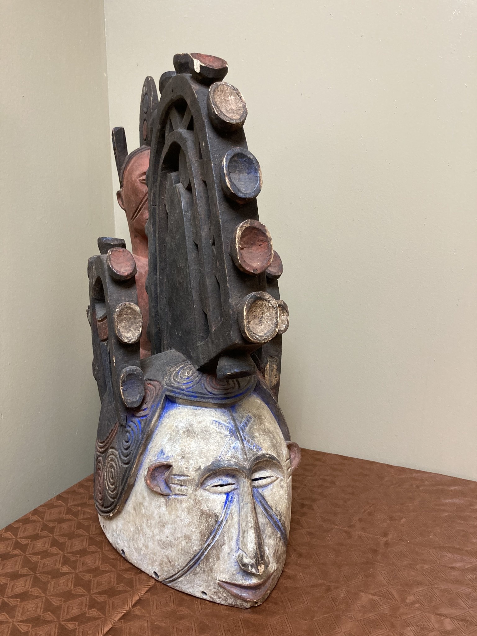 Ibo (Igbo) “Spirit Maiden” mask representing a beautiful young maiden. These masks are danced by men. The Ibo live in the south east of nigeria. 22" tall x 17 1/2" deep x 7" w. $435