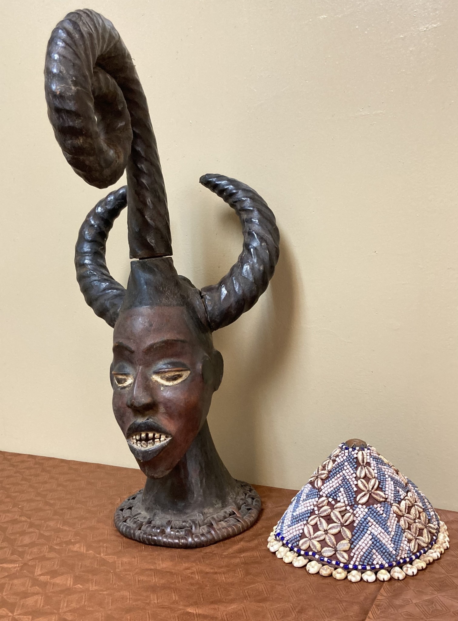 Ekoi (Ejagham): Ekoi wooden masks are covered with animal skin. These figures usually refer to cultural or war heroes. This piece was worn on the top of a woman's head. 20 1/4" tall x 11 1/4" W. Niger