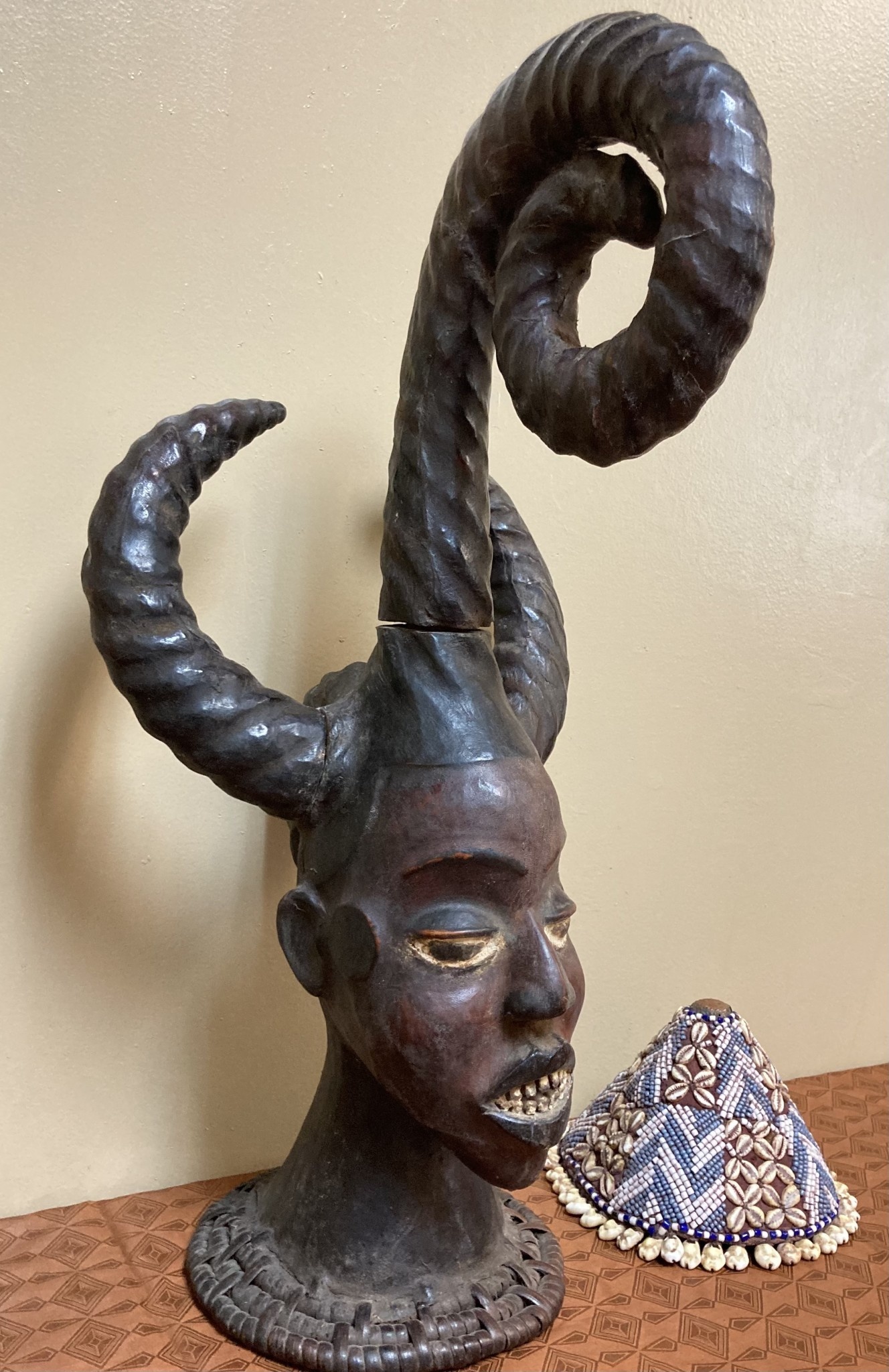 Ekoi (Ejagham): Ekoi wooden masks are covered with animal skin. These figures usually refer to cultural or war heroes. This piece was worn on the top of a woman's head. 20 1/4" tall x 11 1/4" W. Niger