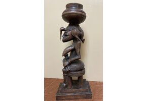 Senufo maternity figure: She references the "Calao" (the hornbill bird), the bird is revered for it's devoted parenting. Wood. 19 1/2 tall" 7 1/4" deep. North central Ivory Coast or Cote D'ivoire