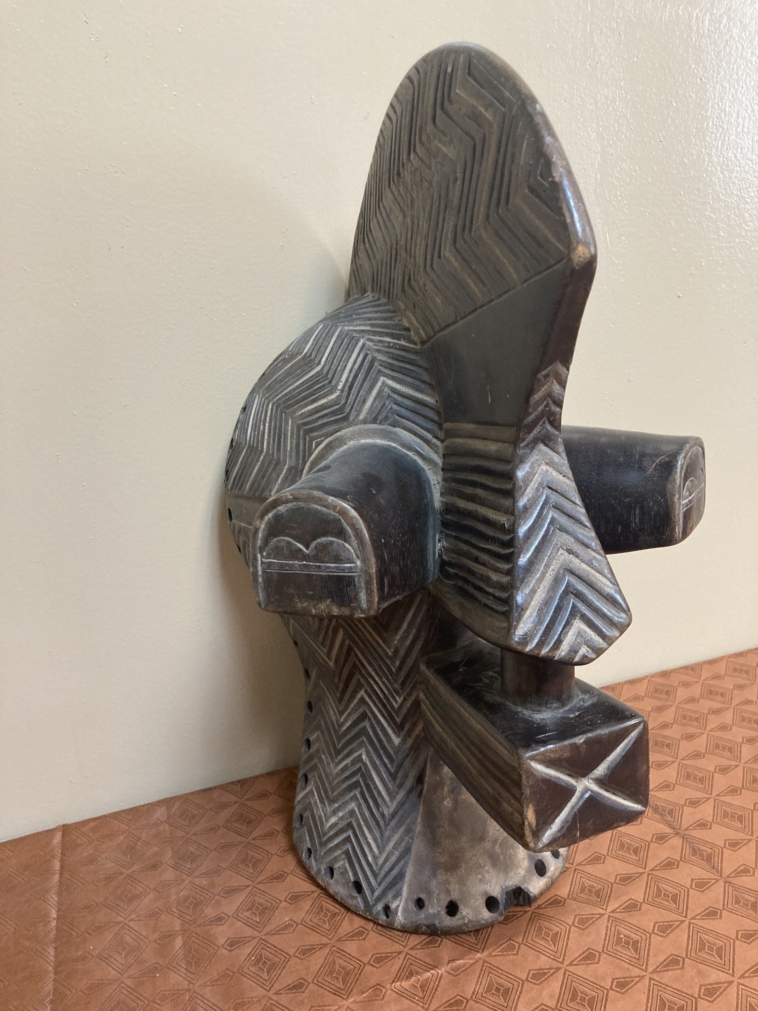 Songye (Basongye if pluralized) mask. They are used by their Bwadi Bwakifwebe secret society. This one is male as expressed by the crest rising above the head. Democratic Rep of Congo. 17 ⅝” tall