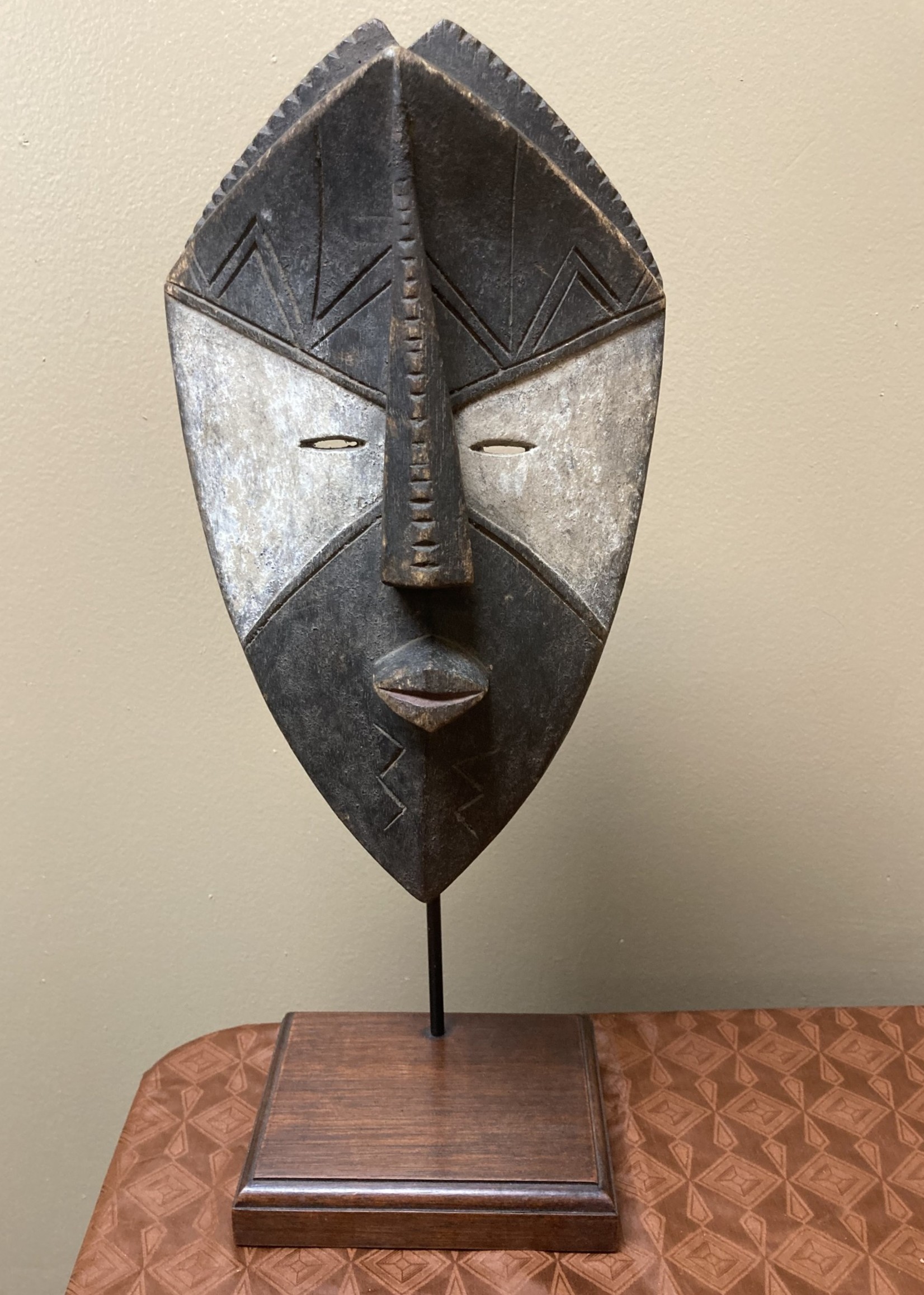 Binji Binji mask” The Binji are one of the 18 Kuba tribes. This mask was used during invitations. Total height with stand is 16 ⅞” (stand with price). In DRC