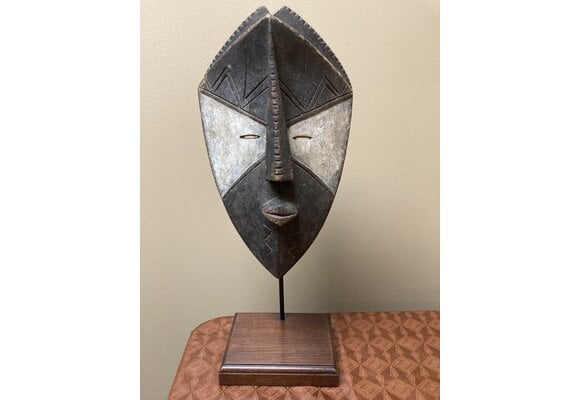 Binji mask” The Binji are one of the 18 Kuba tribes. This mask was used during invitations. Total height with stand is 16 ⅞” (stand with price). In DRC