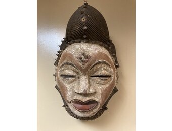 Punu (Bapunu) mask that was probably used in invitations. 17” H x 9” W. The Bapunu live in Gabon.