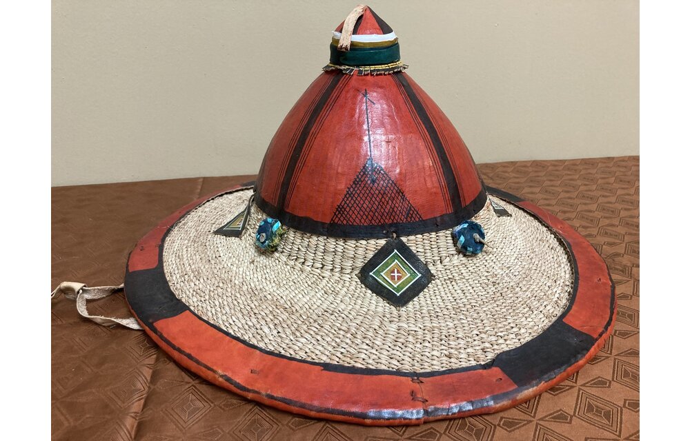 Fulani hat: The Fulani live in about 5-6 african nations (Guinea, Mali, Niger, Senegal, and Nigeria). This is a grand example of their hats, it is larger and fancier than their average hat. 16" diamet
