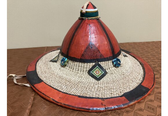 Fulani hat: The Fulani live in about 5-6 african nations (Guinea, Mali, Niger, Senegal, and Nigeria). This is a grand example of their hats, it is larger and fancier than their average hat. 16" diamet