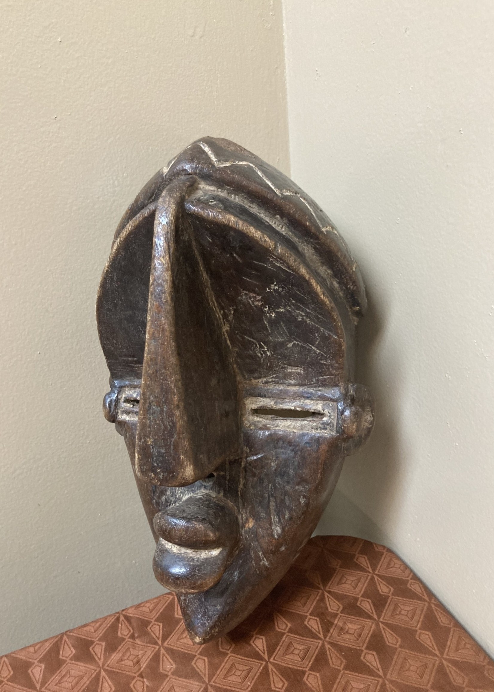 Lwalwa Lwalwa “Mfondo” mask: Worn at initiations and to bring good fortune to the village. The Lwala are related to the Bena Lulua, and reside near Dem Rep of Congo’s border with Angola. 11 ⅞” tall