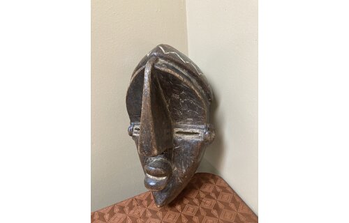 Lwalwa “Mfondo” mask: Worn at initiations and to bring good fortune to the village. The Lwala are related to the Bena Lulua, and reside near Dem Rep of Congo’s border with Angola. 11 ⅞” tall