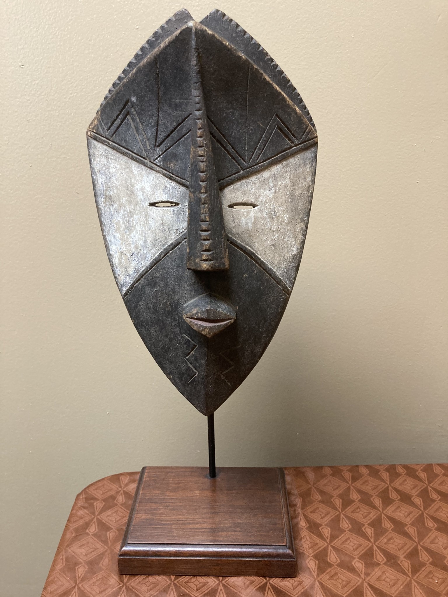 Binji mask” The Binji are one of the 18 Kuba tribes. This mask was used during invitations. Total height with stand is 16 ⅞” (stand with price). In DRC