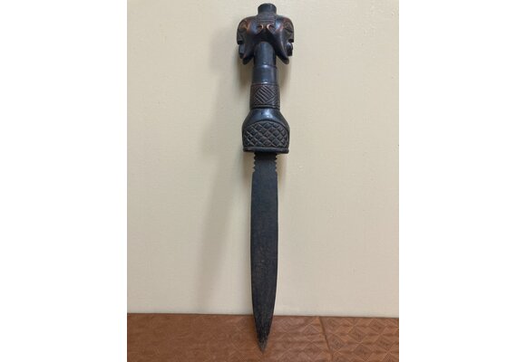 Songye dagger of Democratic Republic of Congo is iron with a wooden, carved handle. 19 ¾” long