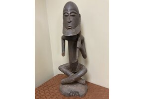 Dogon seated ancestor with a ”Thieves crook” over his shoulder. Height, 26 ⅞” from Mali.